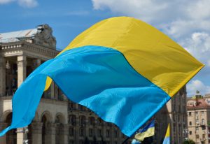 Yellow-blue national banner is fluttering on the wind at the Independence Square in the Ukrainian capital Kyiv.