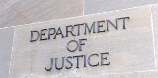Department of Justice sign, Washington DC, USA.
