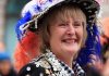 London, United Kingdom - January 01, 2012: A Pearly Queen taking part in the New Year\'s Day procession on The Mall, central London. The Pearly Kings and Queens are a charity organisation associated with working class culture in London."