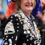 London, United Kingdom - January 01, 2012: A Pearly Queen taking part in the New Year\'s Day procession on The Mall, central London. The Pearly Kings and Queens are a charity organisation associated with working class culture in London."